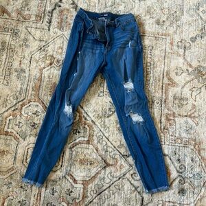 Light blue ripped jeans